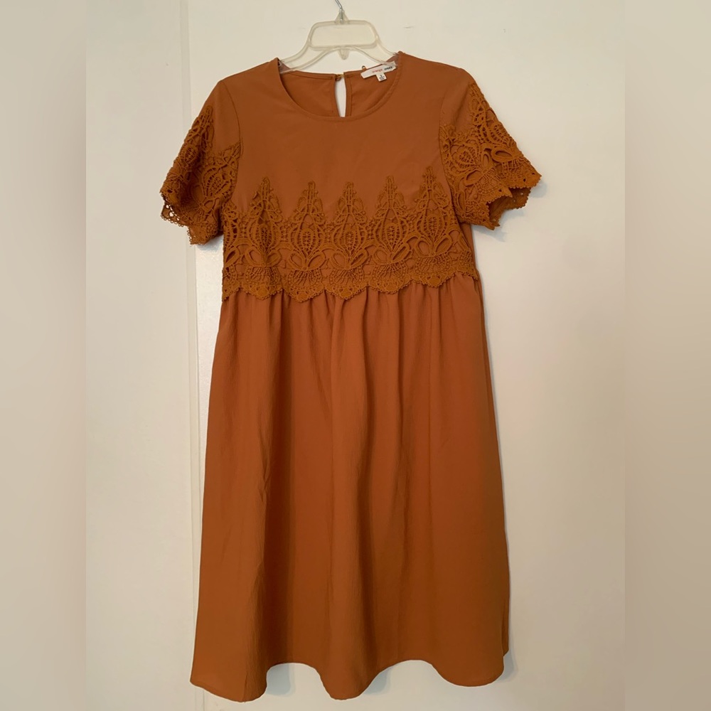 Women’s size S Rust dress bought from Roolee